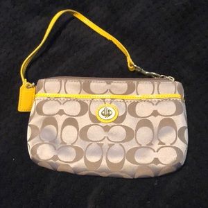 Coach gold and yellow wristlet